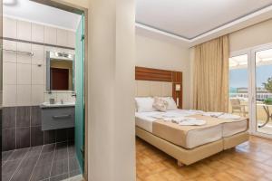Voodi või voodid majutusasutuse Esperia Hotel toas