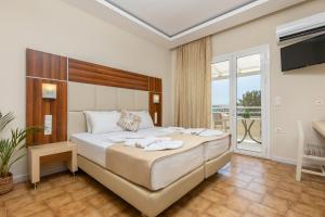 Voodi või voodid majutusasutuse Esperia Hotel toas