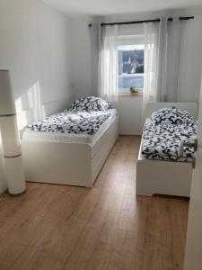 Postel nebo postele na pokoji v ubytování Ferienwohnung Rickelhoff