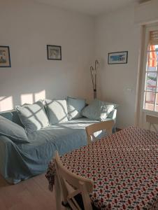 Postel nebo postele na pokoji v ubytování Incantevole e tranquillo borgo storico sul mare