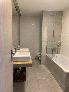 Kúpeľňa v ubytovaní Apartment Dolfi, Senec