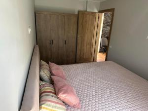 Ένα ή περισσότερα κρεβάτια σε δωμάτιο στο Leja house