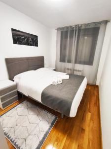 Postel nebo postele na pokoji v ubytování "El Sueño de Sabugo", con garaje y Wifi VUT-5360-AS