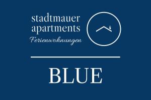 a sign that reads subordinate apartments fertilizer administrator blue at stadtmauer apartments - Stilvolle Wohnung mit King Bett direkt an der historischen Stadtmauer in Nördlingen