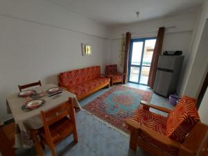 A seating area at Anglo Chalets - Ageeba beach