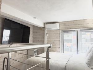 TV a/nebo společenská místnost v ubytování Duplex neuf à 30s des plages