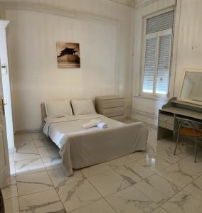 Postel nebo postele na pokoji v ubytování Chambre calaisfornia