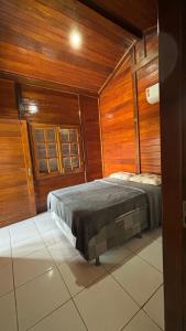 Postel nebo postele na pokoji v ubytování Chalé Vila das Dunas