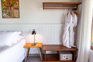 Postel nebo postele na pokoji v ubytování Hotel Paraiso do Morro
