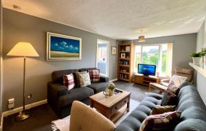 TV a/nebo společenská místnost v ubytování Spacious 2 Bed-Flat in Glasgow City - Free Parking