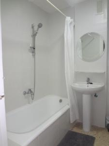 Koupelna v ubytování Hotel Carlos I