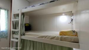Postel nebo postele na pokoji v ubytování Kochimoto Guestroom
