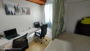 TV a/nebo společenská místnost v ubytování Kochimoto Guestroom