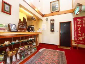 a room with a door and a shelf of food at Kawaguchiko Inn Yesterday in Fujikawaguchiko +8 photos