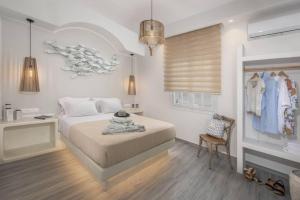 Posteľ alebo postele v izbe v ubytovaní Naxos Kastraki Boutique House With MVigla Seaview