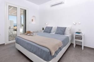 Posteľ alebo postele v izbe v ubytovaní Villa Agali Naxos Glyfada Kastraki + 20 fotografií