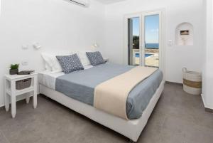 Posteľ alebo postele v izbe v ubytovaní Villa Agali Naxos Glyfada Kastraki