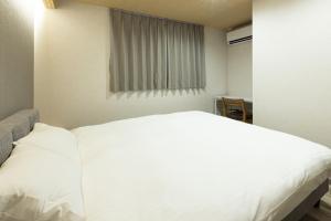 Ένα ή περισσότερα κρεβάτια σε δωμάτιο στο 清川偕隠 - Kiyokawa Kainn
