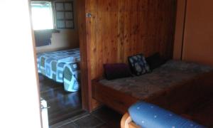 A bed or beds in a room at Kerizara Baserria