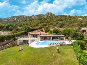 an image of a villa with a swimming pool at Luxe Côte Stay- Elegant Villa in Porto Cervo