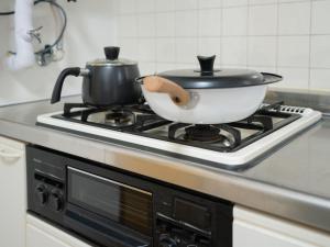 A cozinha ou kitchenette de 201号室貸切 京成佐倉駅徒歩3分 電車成田空港20分 京成上野直結