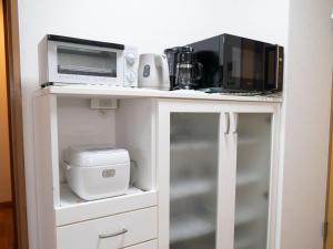 A cozinha ou kitchenette de 201号室貸切 京成佐倉駅徒歩3分 電車成田空港20分 京成上野直結