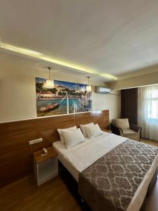 Postel nebo postele na pokoji v ubytování Lucid Hotel