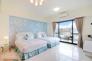 Voodi või voodid majutusasutuse Dibao 16 Homestay toas
