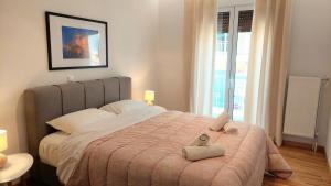Posteľ alebo postele v izbe v ubytovaní Wonderful apartment in Acropolis