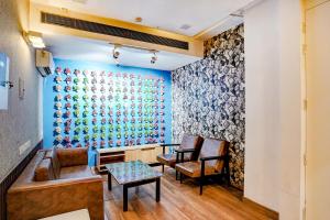 Posezení v ubytování FabHotel Kaushambi + 26 fotografií