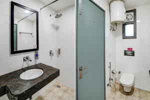 Koupelna v ubytování FabHotel Kaushambi