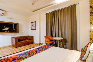 Postel nebo postele na pokoji v ubytování FabHotel Kaushambi