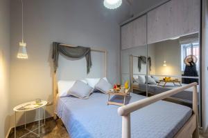 Ένα ή περισσότερα κρεβάτια σε δωμάτιο στο Oasis Home