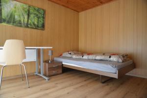 Postel nebo postele na pokoji v ubytování Grosse, schöne Wohnung im Grünen