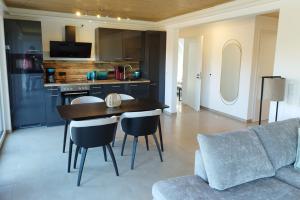 Kuchyň nebo kuchyňský kout v ubytování Apprimus Ferienwohnungen - Waldsee Rieden Panoramaterrasse 6 EG + 6 fotografií