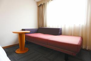 Postel nebo postele na pokoji v ubytování Hotel Castle Inn Ise Meotoiwa