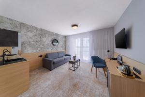 TV a/nebo společenská místnost v ubytování Hotel Senec Aqua Resort - Family friendly