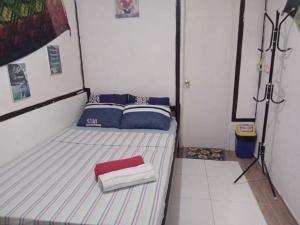 Voodi või voodid majutusasutuse el nido hostel sun valley toas