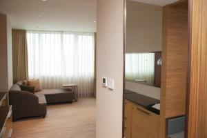 Rúm í herbergi á Four Points by Sheraton Shanghai, Daning