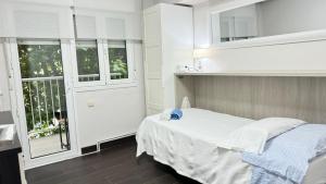 Łóżko lub łóżka w pokoju w obiekcie Apartamento Anoeta