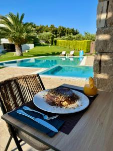 Bazén v ubytování Possidi Hiliadou Boutique Resort nebo v jeho okolí