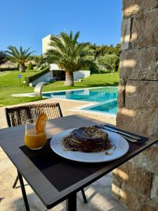Bazén v ubytování Possidi Hiliadou Boutique Resort nebo v jeho okolí
