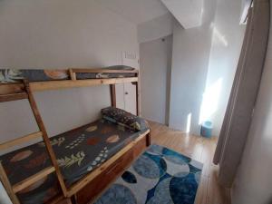 Postel nebo postele na pokoji v ubytování Cozy Condo in Downtown Naga