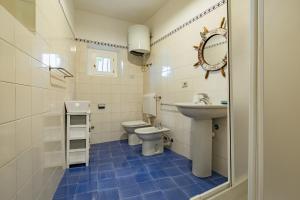 Koupelna v ubytování Tenuta Bussadori - Dimora Del Corsaro + 30 fotografií