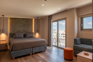 Ein Bett oder Betten in einem Zimmer der Unterkunft Wellnest Hotel