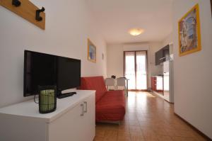 A television and/or entertainment centre at Residence Valbella