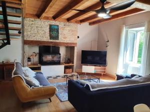 Posezení v ubytování Gite de Charme Gite du Hameau