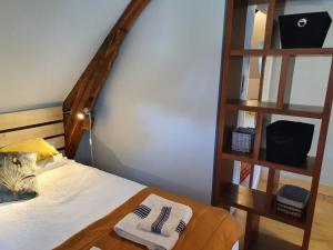 Postel nebo postele na pokoji v ubytování Gite de Charme Gite du Hameau