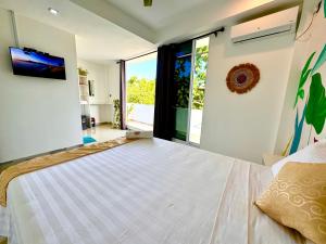 Sands Garden Hotel客房内的一张或多张床位