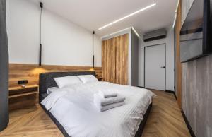 Posteľ alebo postele v izbe v ubytovaní Luxury apartments GREAT